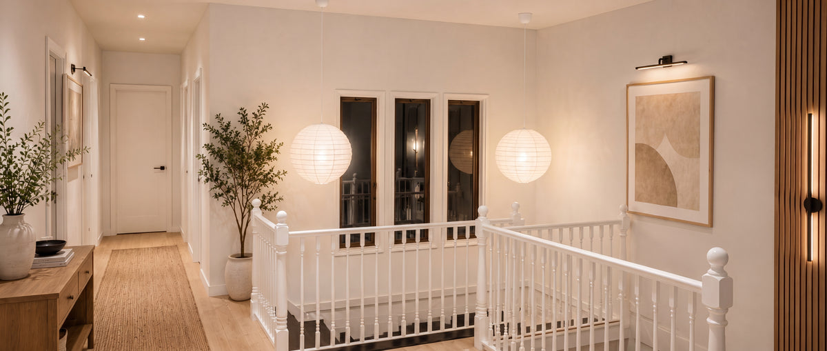 Two paper moons on the landing.
