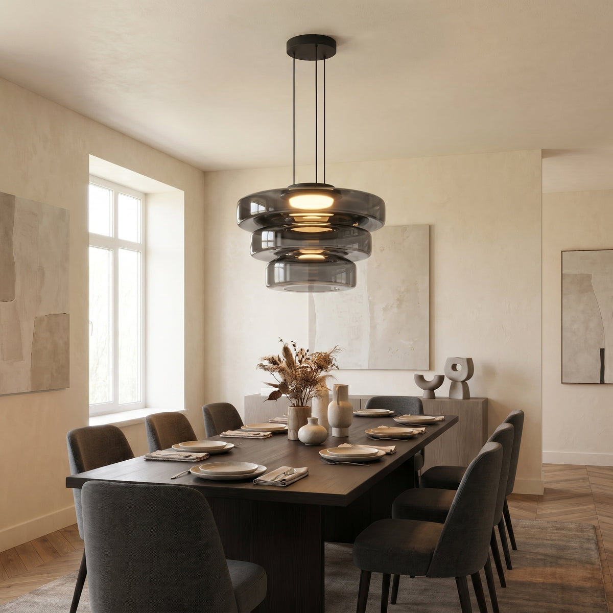 Glass pendant light hanging above a kitchen island