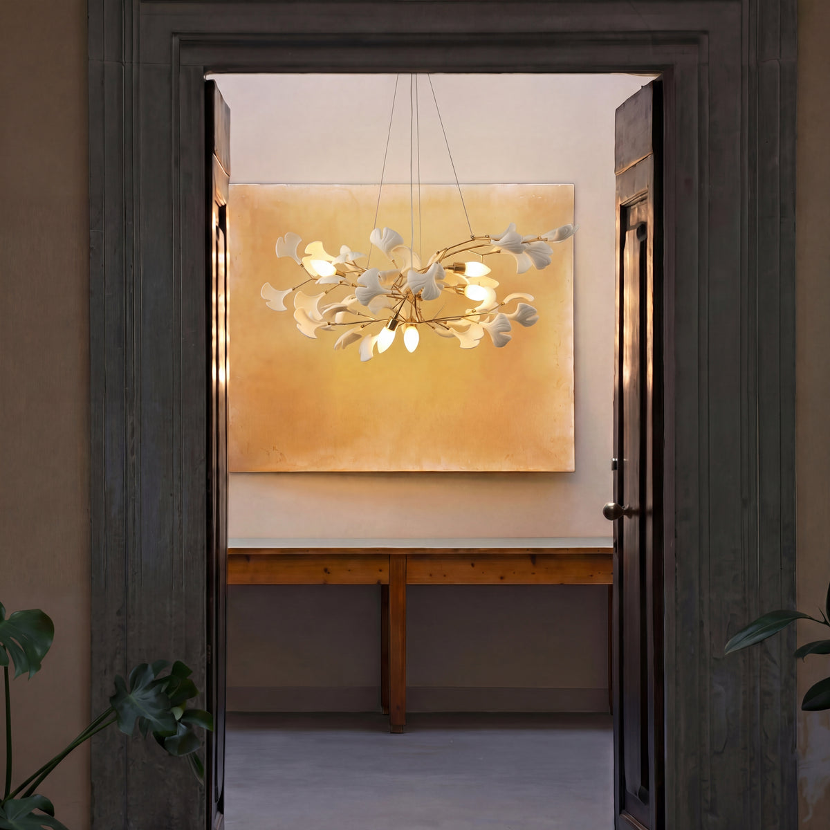 Chandeliers shown at correct height above dining tables