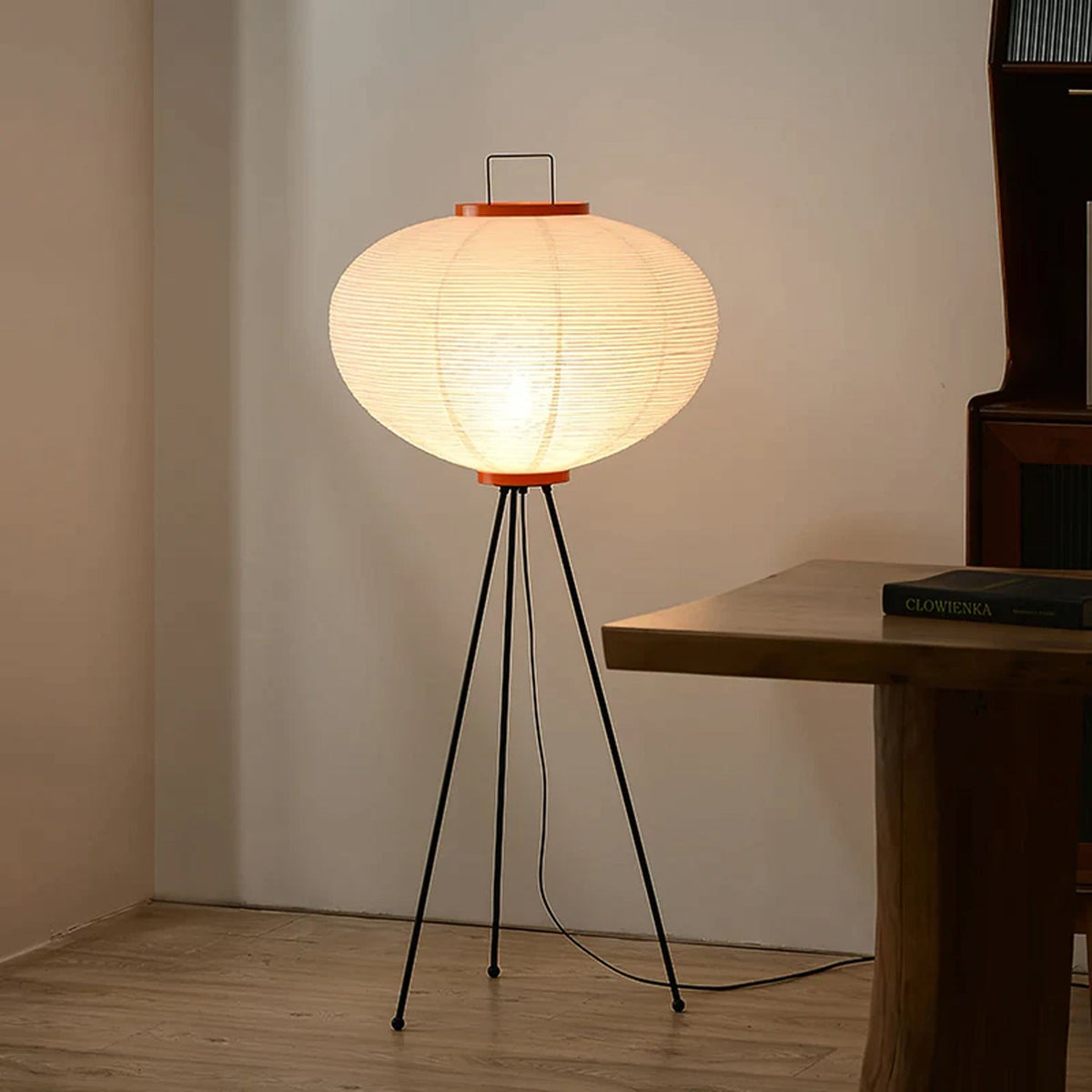 Paper floor lamp bringing warmth to a quiet corner